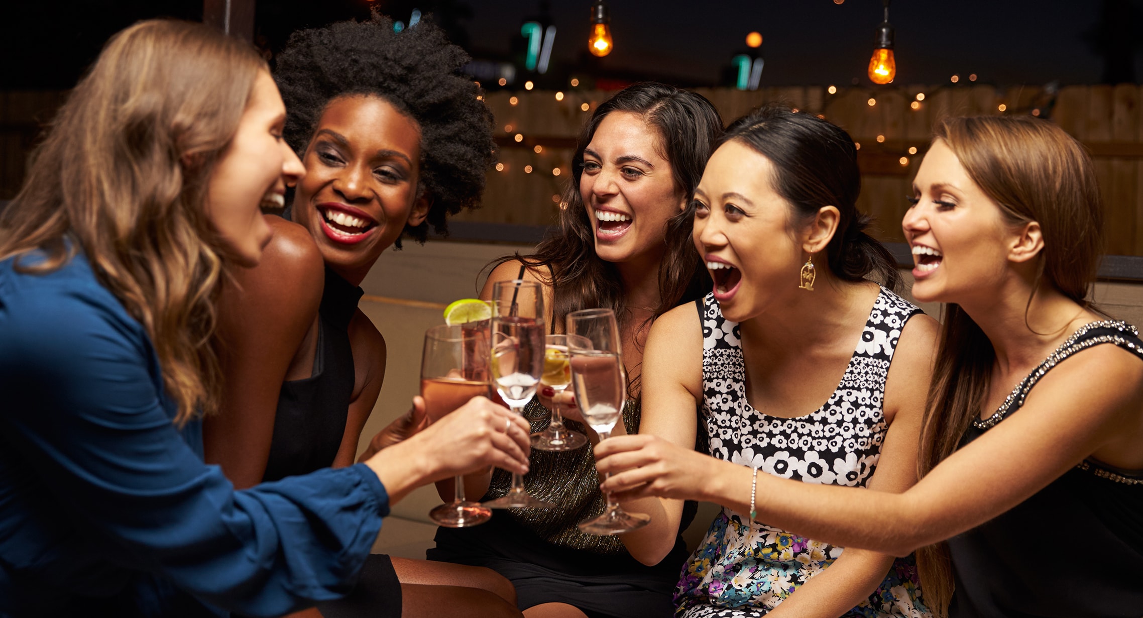 group of ladies having a fun night out and drinking