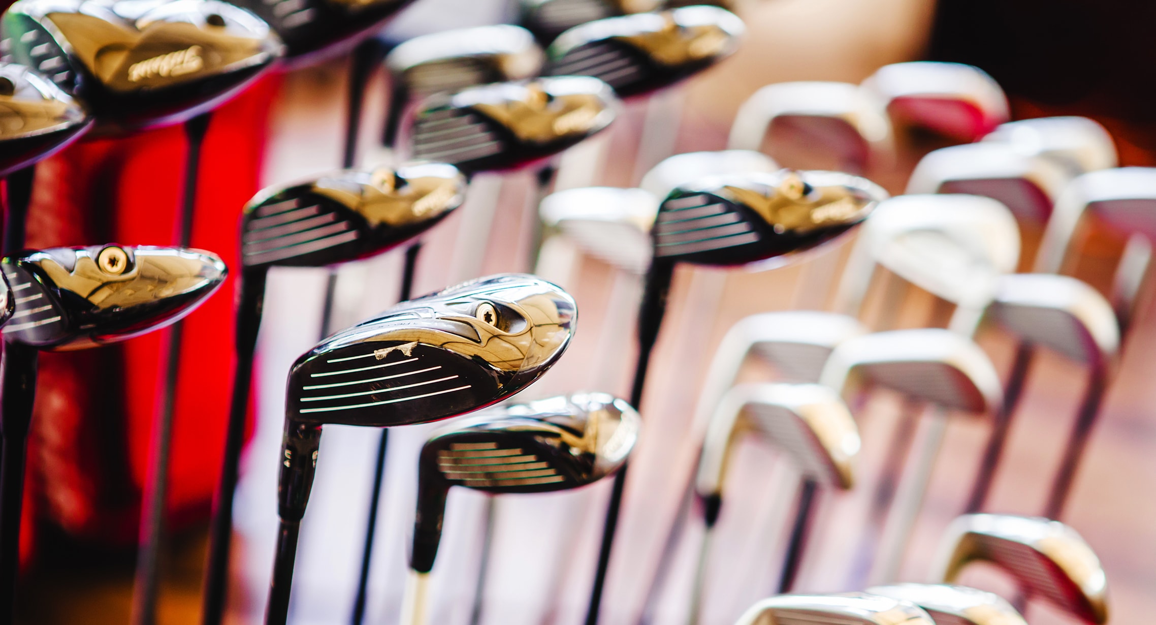 close up of multiple golf clubs